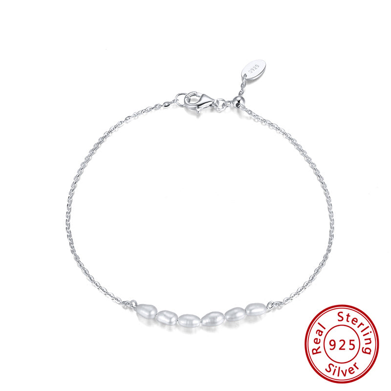 sterling silver pearl bracelet for women with beautiful rhodium plated design
